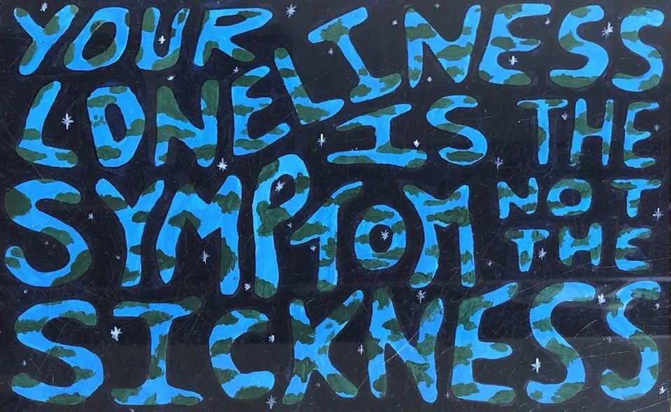 Amber Frizzell's artwork spells out the phrase 'Your loneliness is the symptom not the sickness' in a font that is coloured like the earth. 
