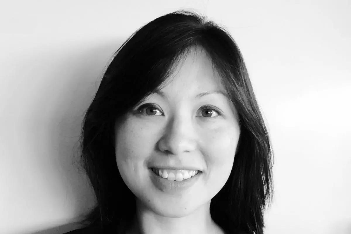 Black and white photo of Nicola Fawcett smiling 