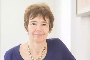 Sally Shuttleworth wears a purple top